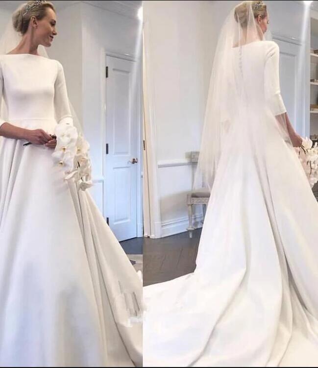 boat-neck-3/4-sleeves-satin-wedding-gown-with-pockets-1
