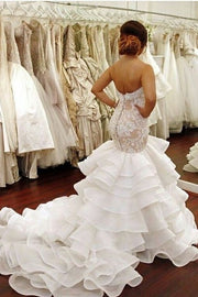 backless-lace-strapless-bridal-dresses-mermaid-ruffled-train