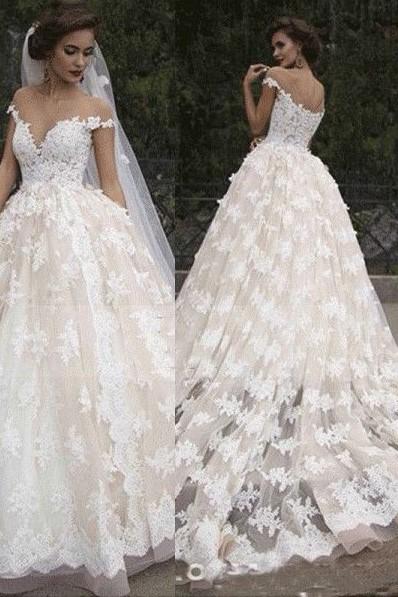 cap-sleeves-lace-wedding-dress-with-transparent-neckline-1