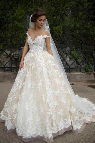 cap-sleeves-lace-wedding-dress-with-transparent-neckline