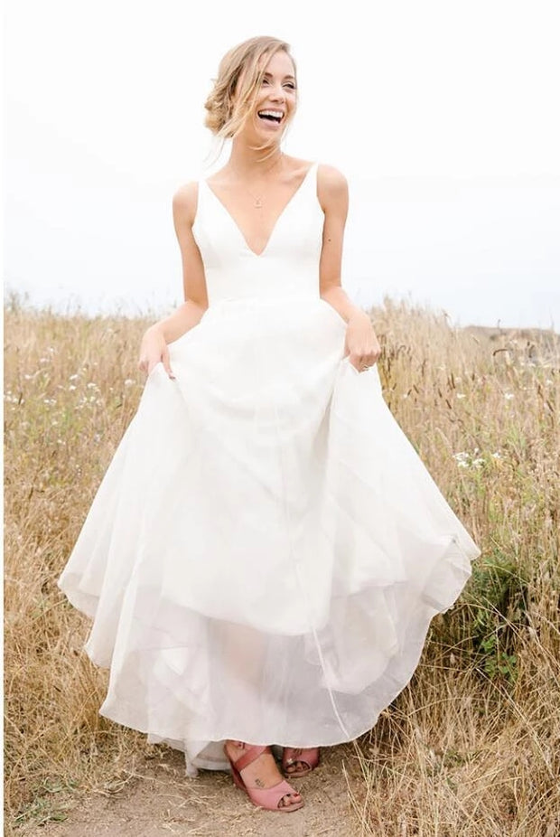 deep-v-neckline-sleeveless-chiffon-simple-beach-wedding-dresses