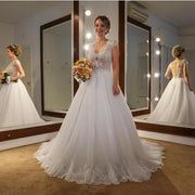 illusion-lace-beaded-wedding-dress-with-cap-sleeves-1
