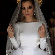 long-sleeves-white-wedding-gown-with-flounced-skirt-6