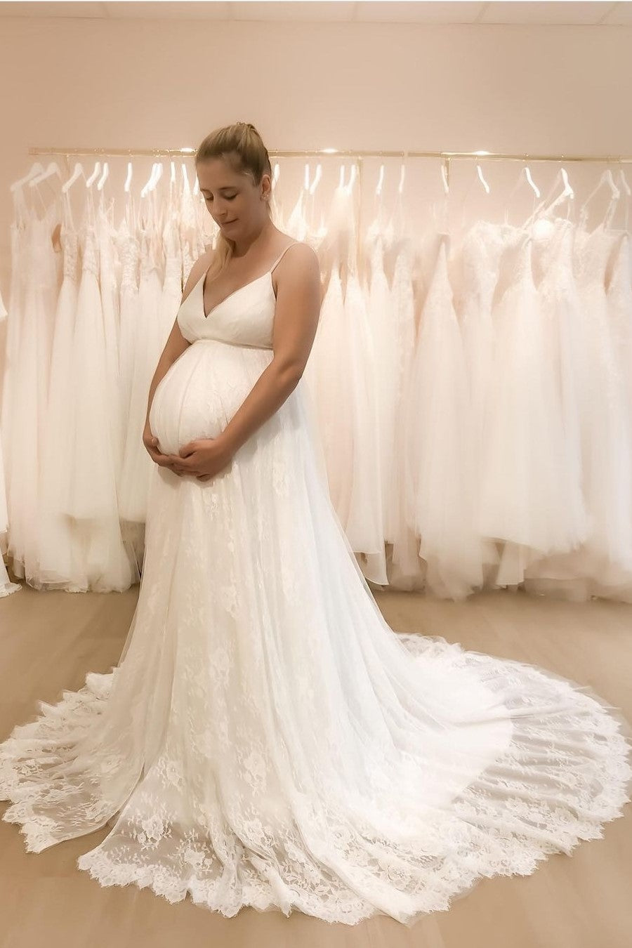 pregnant-woman-wedding-dress-with-lace-train