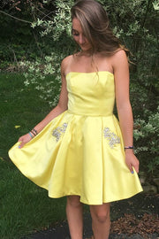 short-yellow-cocktail-party-gown-with-rhinestones-pockets