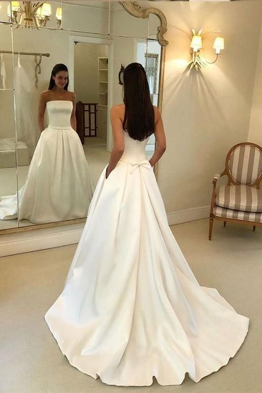strapless-open-back-satin-wedding-gown-with-pockets-1