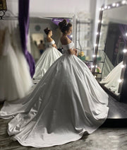 structured-satin-ball-gown-wedding-dress-with-off-the-shoulder-sleeves-1